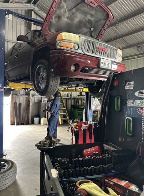 GMC up on the lift for inspection